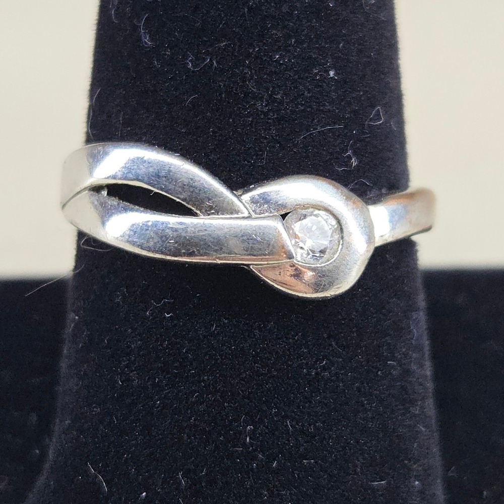 Silver Tone Infinity Knot Bypass Wrap Ring Clear Round Stone Size 10 AS IS